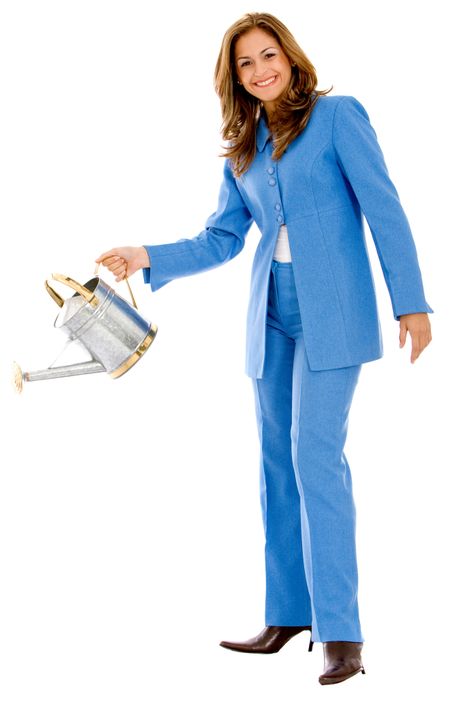 Business woman watering something imaginary isolated