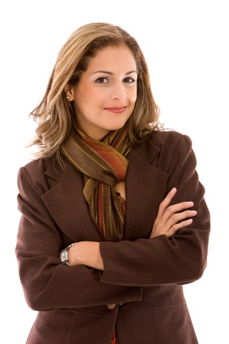 Businesswoman standing with her arms crossed isolated over white