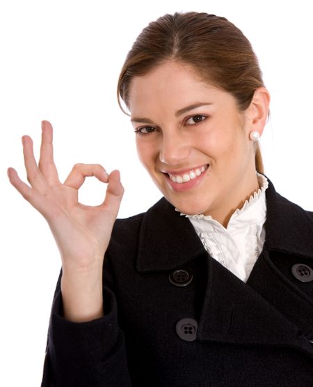 business woman doing the ok sign smiling - isolated
