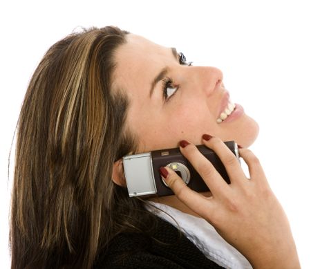 Business woman on the phone looking at the corner of the image - isolated
