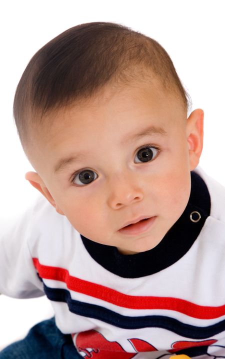 baby boy with a surprised expression on his face over a white background