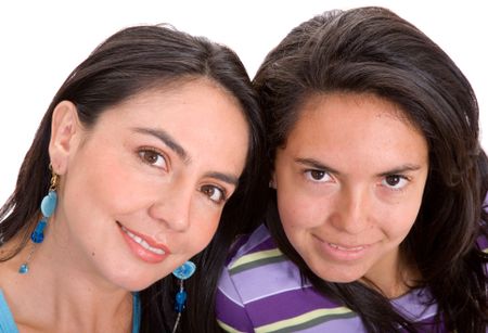 beautiful sisters portrait over a white background