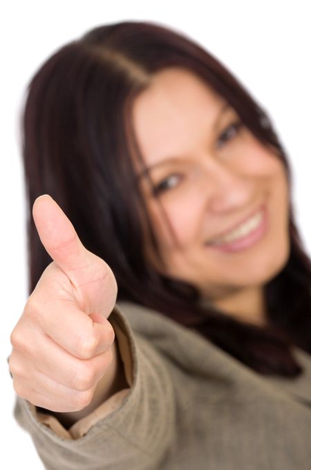 business woman with her thumbs up smiling over a white background