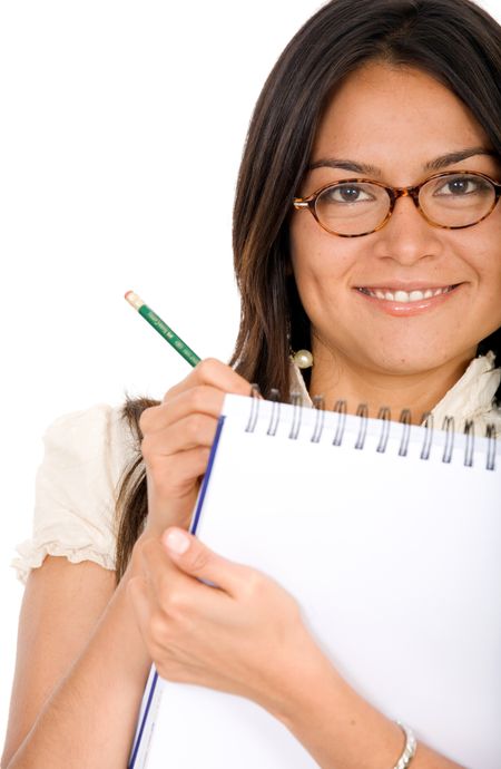 business woman wearing glasses writing on a notepad