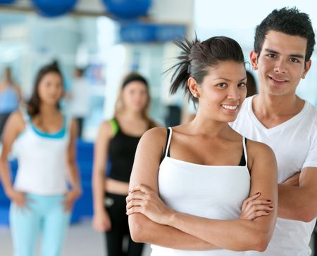 group of people at the gym smiling