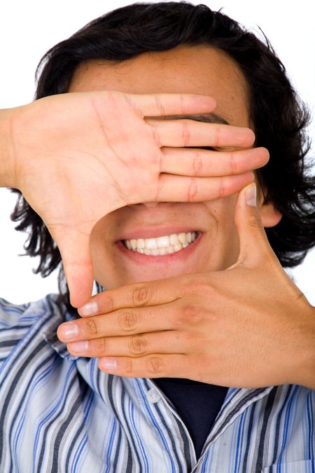 casual guy hand framing a smile over a white background