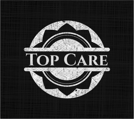 Top Care chalk emblem written on a blackboard