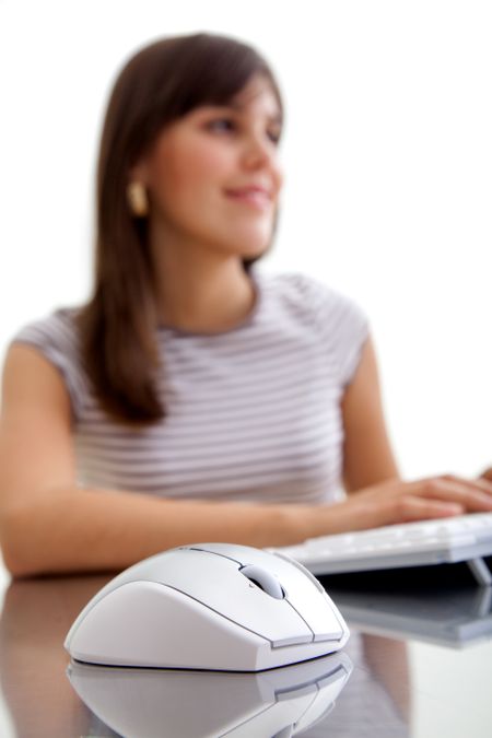 Casual woman working on a computer - focus on mouse