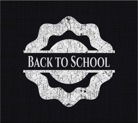 Back to School chalk emblem written on a blackboard