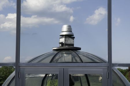 Roof of greenhouse reflected in campus window -- Elgin Community College, Elgin, Illinois