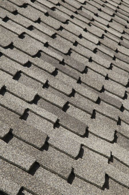 Asphalt shingles on sloped roof