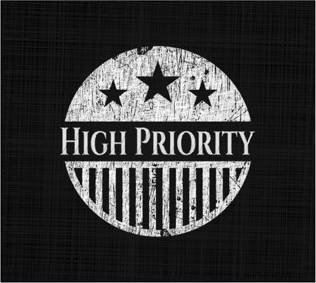 High Priority chalkboard emblem on black board