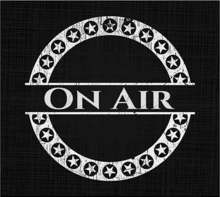 On Air chalkboard emblem written on a blackboard