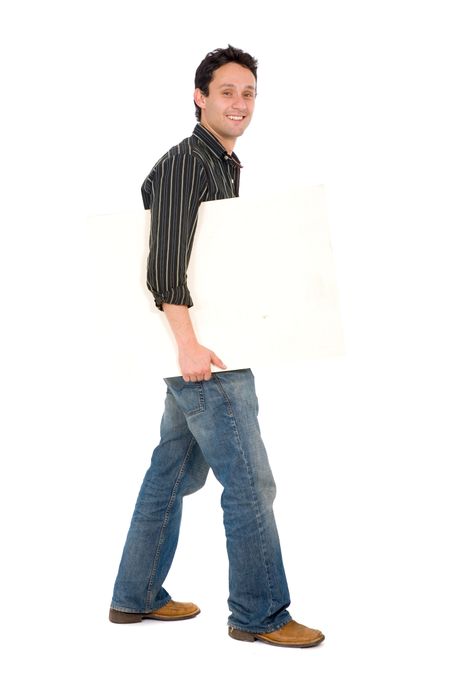 Friendly man holding a white board while walking over a white background