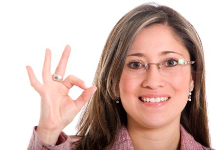 Business woman doing the ok sign over a white background
