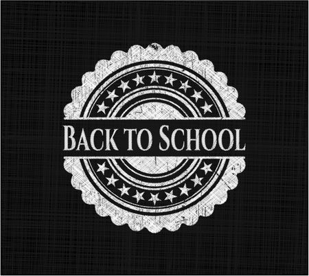 Back to School chalk emblem written on a blackboard