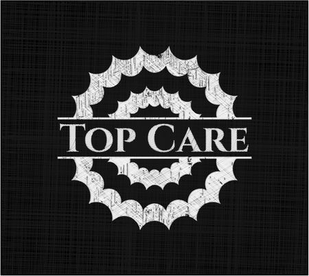 Top Care chalkboard emblem on black board
