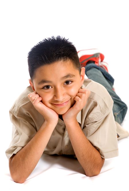 young boy portrait on the floor over a white background