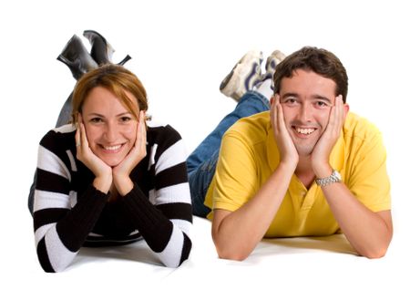 Beautiful couple on the floor over a white background