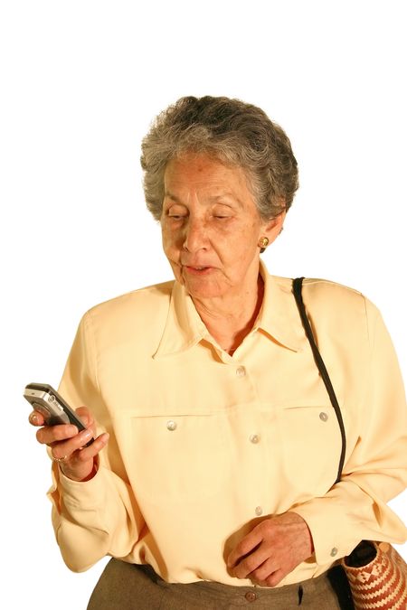 elderly woman texting on a mobile phone