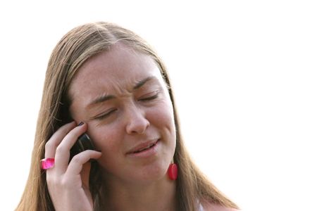 casual woman on the phone receiving bad news