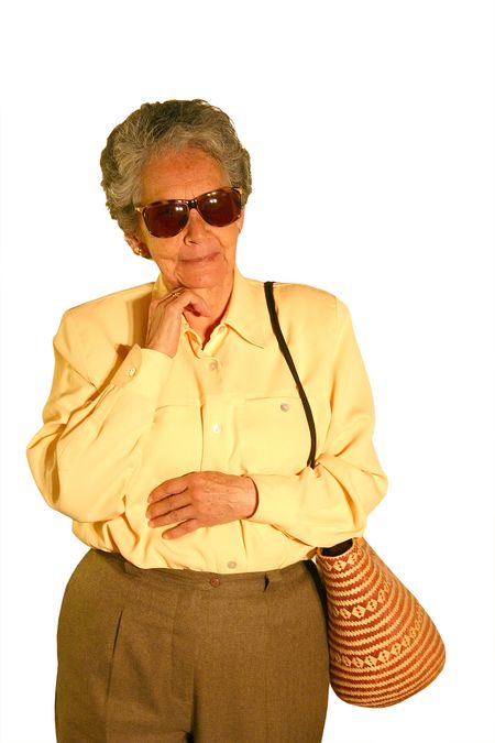 elderly tourist on a white background wearing sunglasses