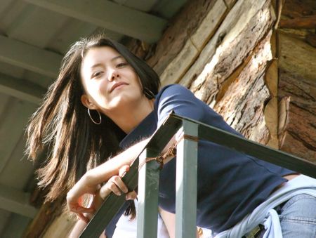 gorgeous teenager modeling on a tree house
