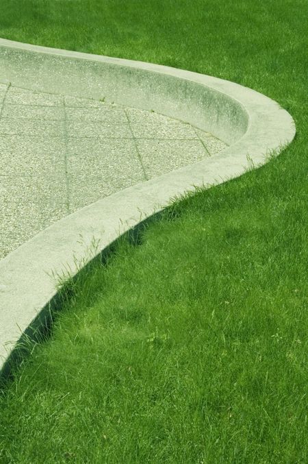 Concrete curve and grass on college campus