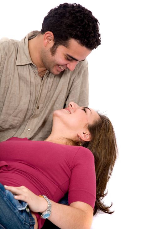 beautiful couple in a romantic moment isolated over a white background