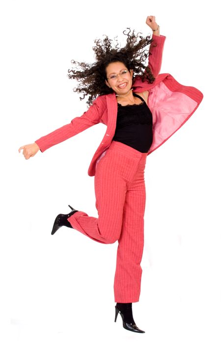 happy business woman with a big smile jumping dressed in red over a white background