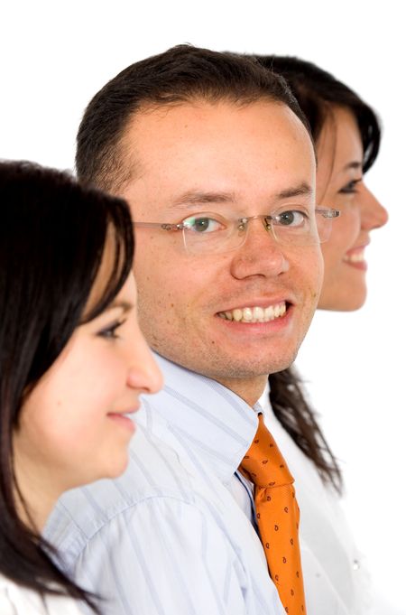 business team with two girls looking away and the man in glasses facing the camera and smiling - focus is on him