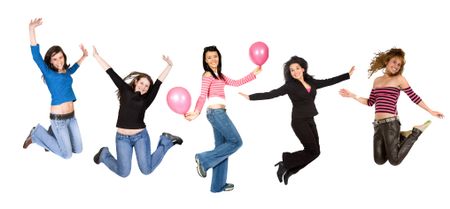 beautiful girls jumping and holding balloons over white