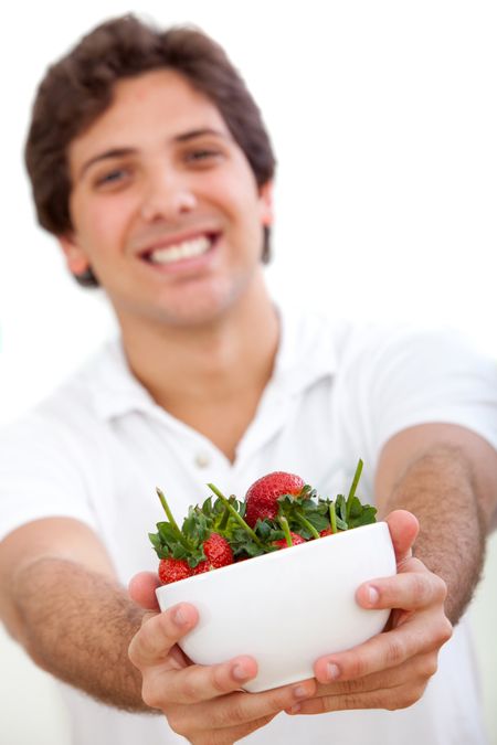 Man holding some strawberries isolated over white