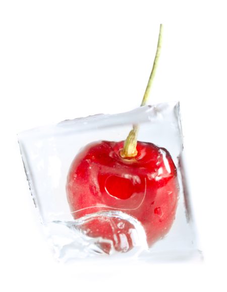 Cherry on ice isolated over a white background