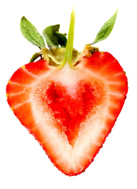 Heart shaped strawberry isolated over a white background