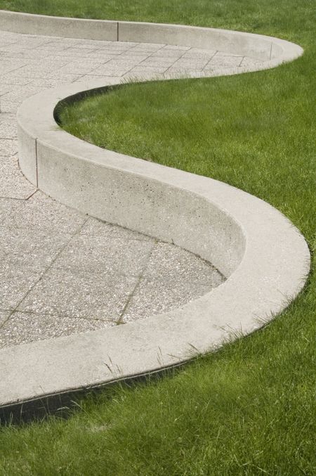 Concrete curves and grass on college campus