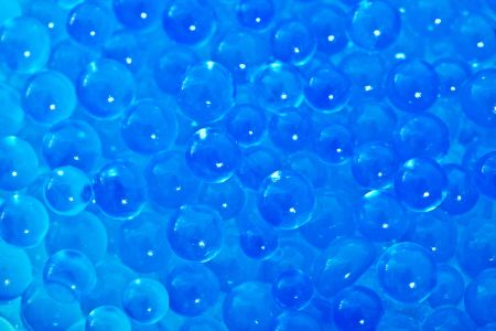 Abstract background with blue bubbles or pearls