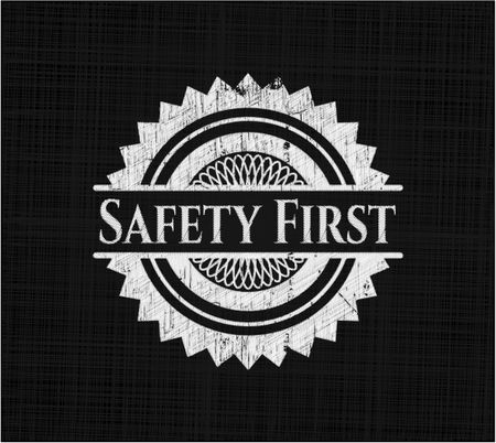 Safety First chalkboard emblem on black board