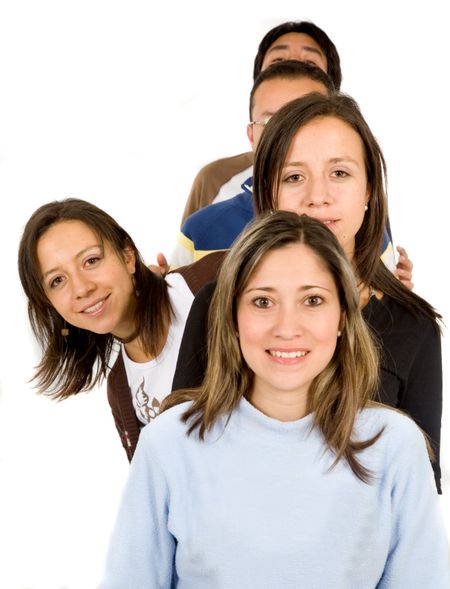 group of young people waiting in line with one sticking her head out - focus is on the girl with the face on the side