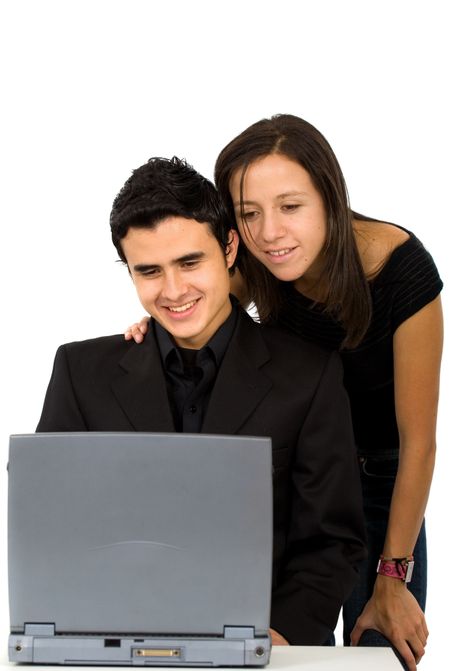 young couple on a laptop computer isolated over a white background
