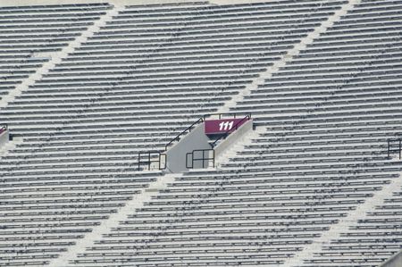 Red gate at college football stadium, telephoto view