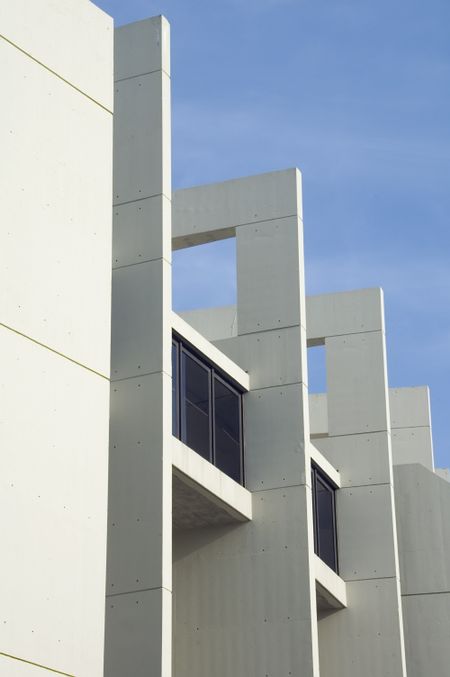 Vertical buttresses along college athletic administration building