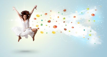 beautiful-woman-jumping-colorful-gems-crystals-323654153 Beautiful woman jumping with colorful gems and crystals on the background concept