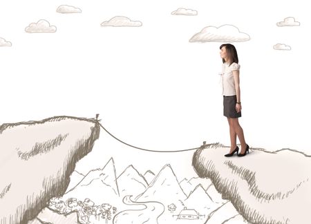Businesswoman standing on the hand drawn edge of mountain