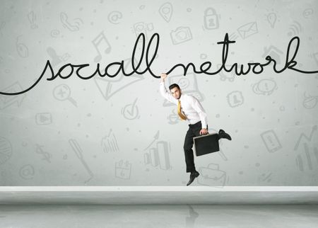 Businessman hanging on a social network rope
