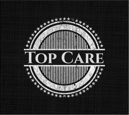 Top Care chalkboard emblem on black board