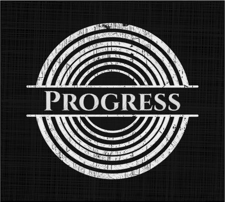 Progress written on a blackboard