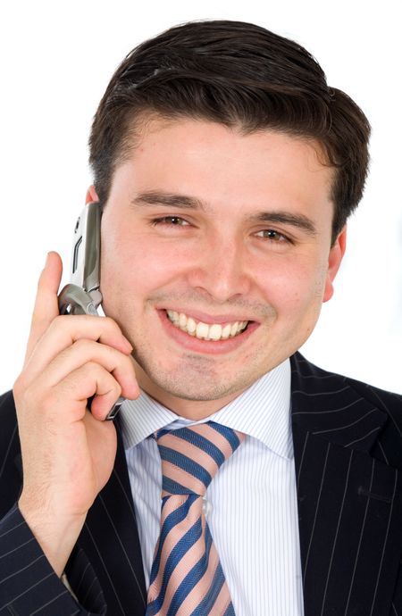 Business man on the phone smiling - isolated over a white background
