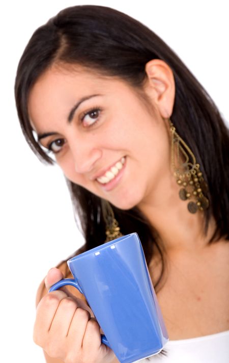 girl with a healthy drink isolated over a white background - focus is on the blue mug