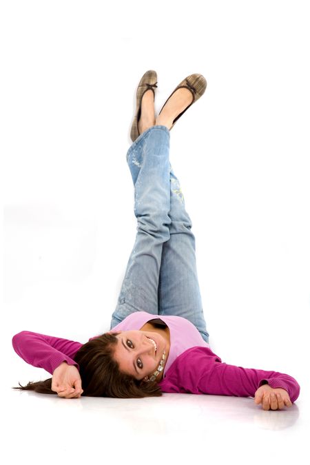 beautiful girl portrait on the floor with her legs up isolated over a white background